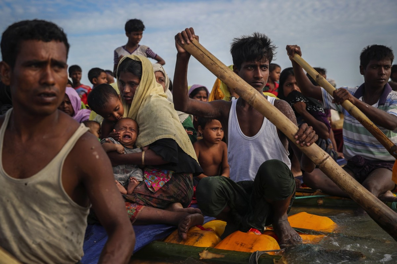The photography staff of Reuters won a Pulitzer Prize for feature photography for “shocking photographs that exposed the world to the violence Rohingya refugees faced in fleeing Myanmar.” Here, the refugees cross the Naf River with an improvised raft to reach Teknaf, Bangladesh in November.